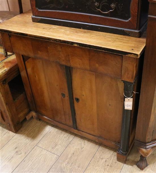 A mid 19th century German fruitwood cupboard, fitted with a frieze drawer over doors W.81cm